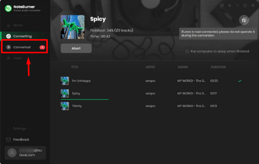 interface showing the progress of converting track in iTunes