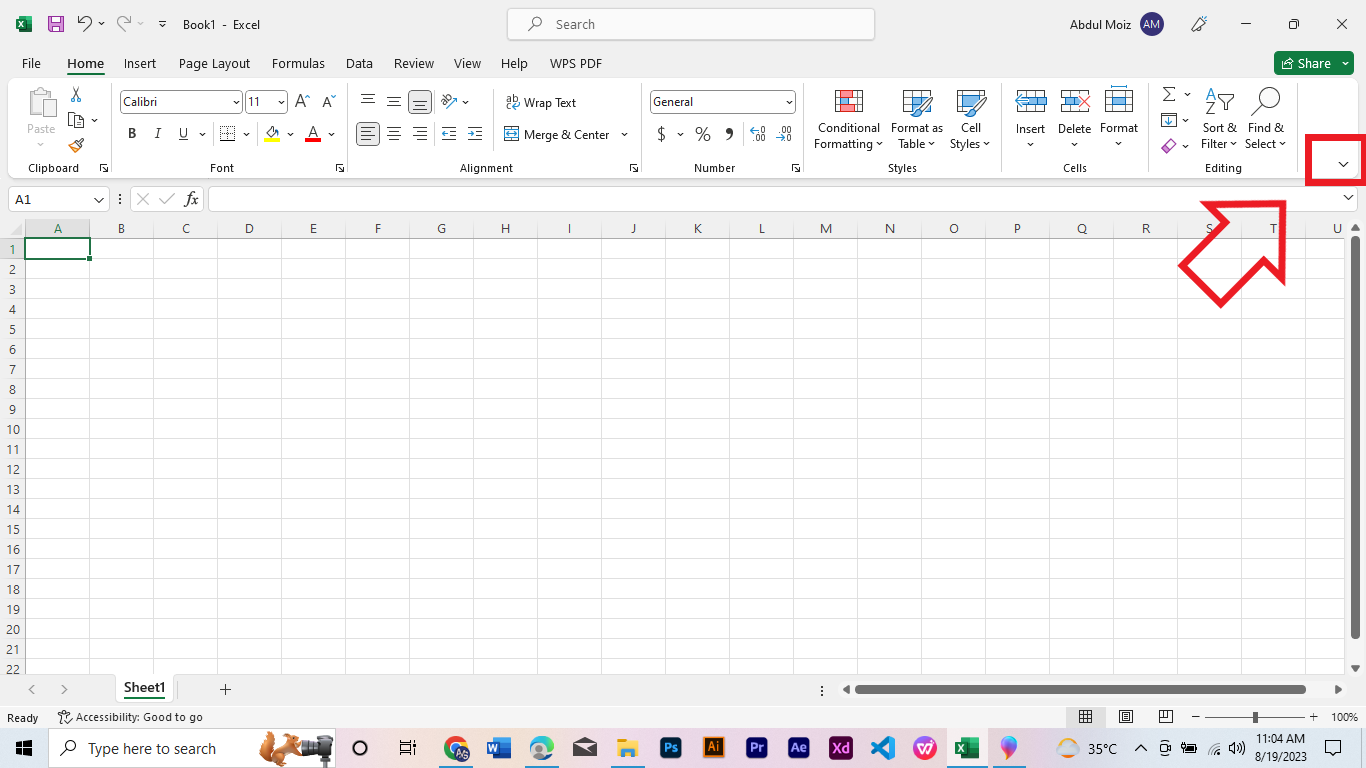 Small arrow icon (^) located at the right end of the ribbon (near trio buttons), at the top right corner of the Excel window. This is called the 