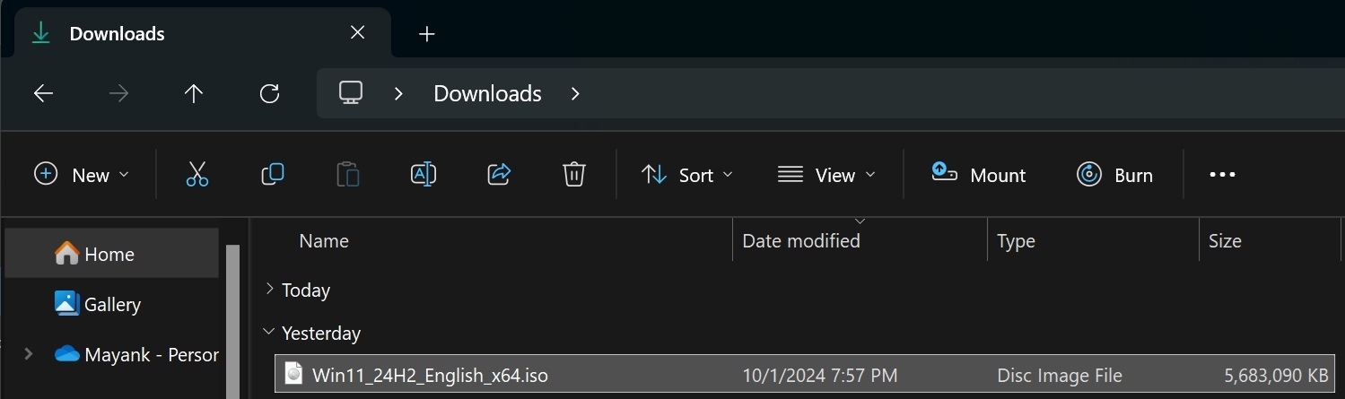 After downloading, locate the ISO file in your Downloads folder or wherever you saved it.