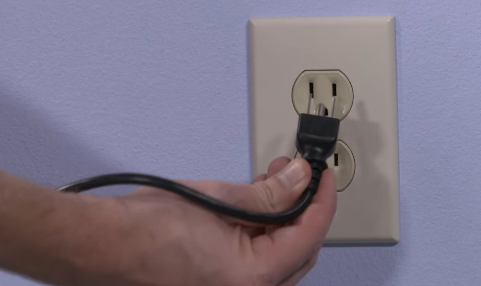  Plugging the charger into a different socket